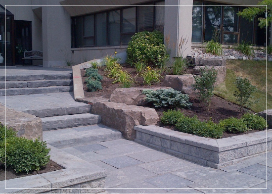 commercial stonework steps and retaining wall