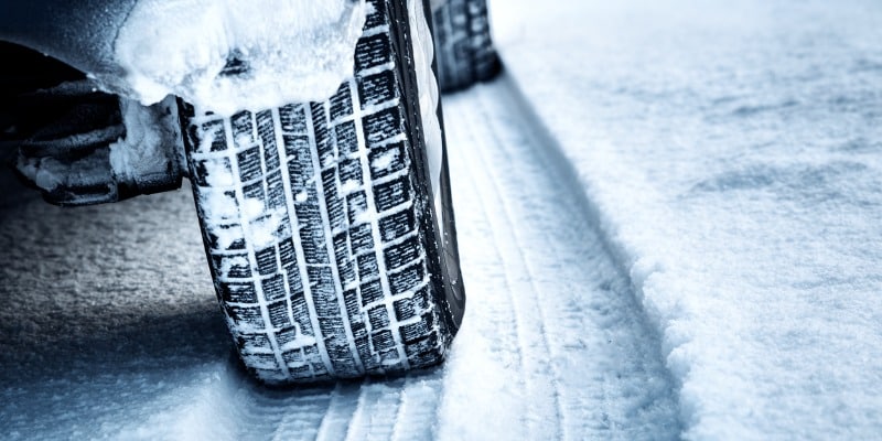 Close up of tire in snow