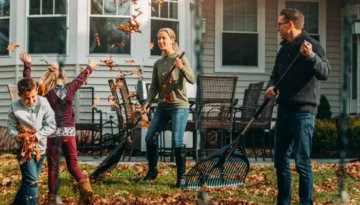 cheerful-family-raking-autumn-leaves.jpg